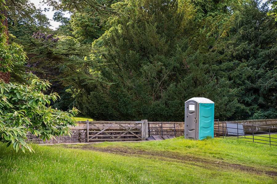 portable toilet in the barn
